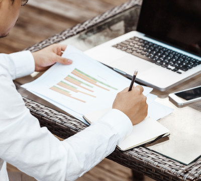 business-concept-young-business-man-woking-on-fina-K7664BK.jpg